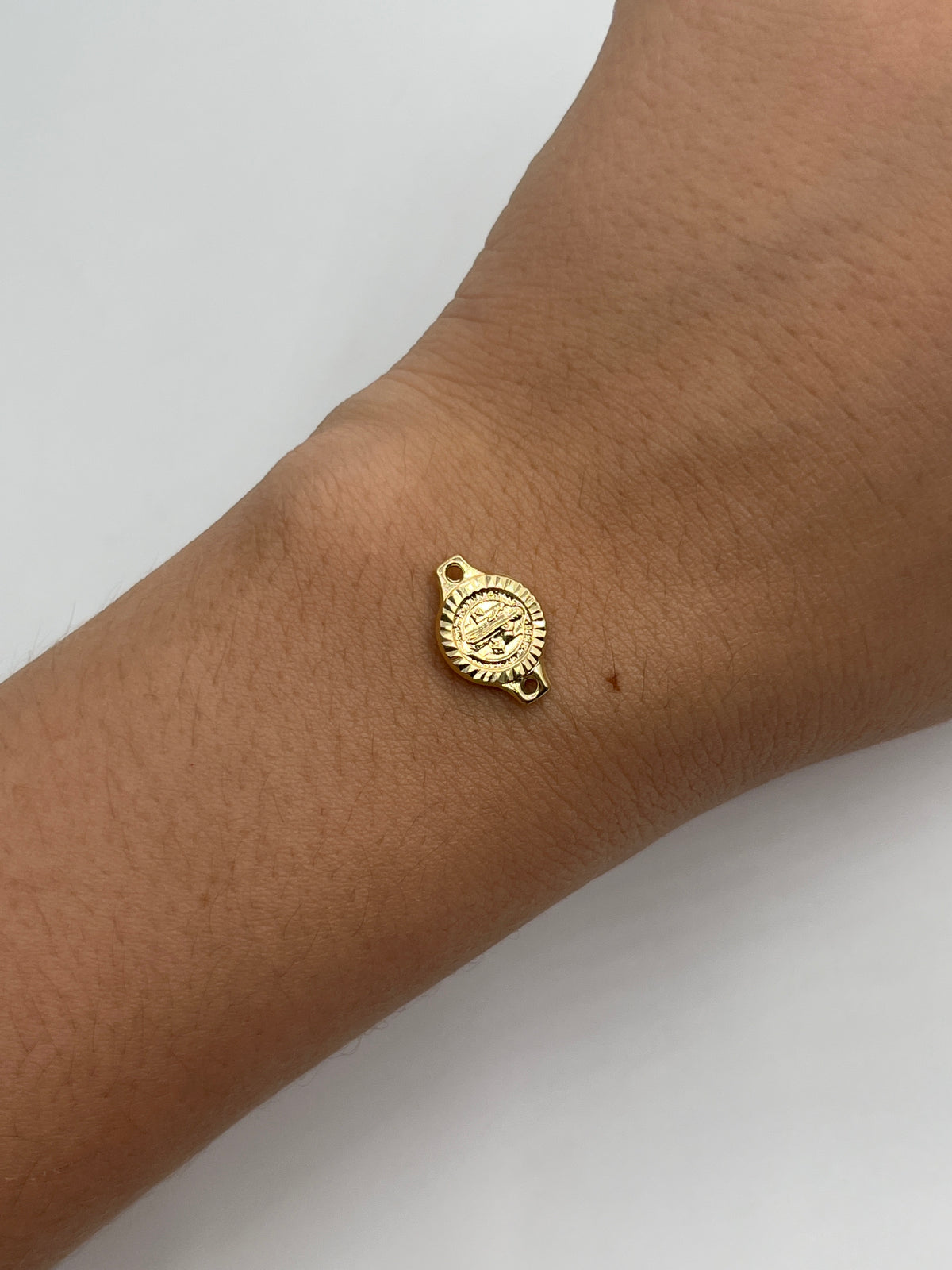 Herraje San Benito Diamantado Oro amarillo 18k 0,52 Gr / 1 Cm