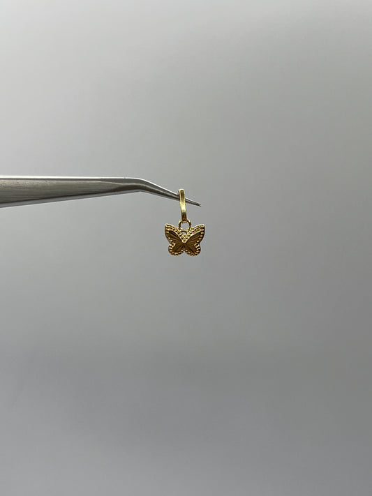 Dije Mariposa Diamantada Oro amarillo 18k 0,34 Gr / 8,20 mm / 0,8 Cm
