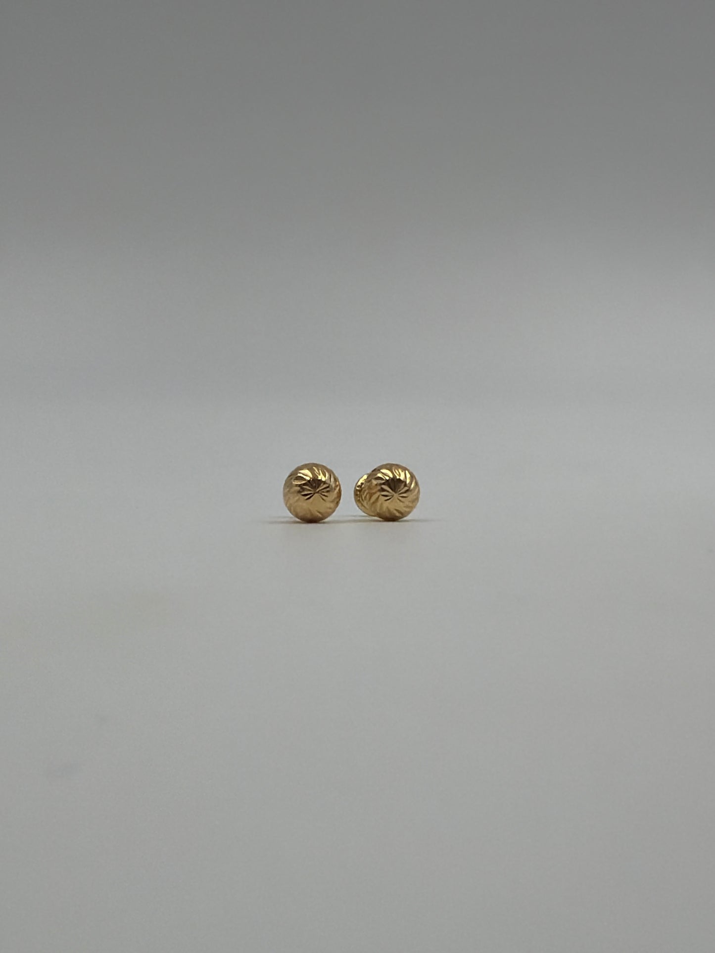 Topos diamantados Oro amarillo 18k 0,77 Gr / 7 mm