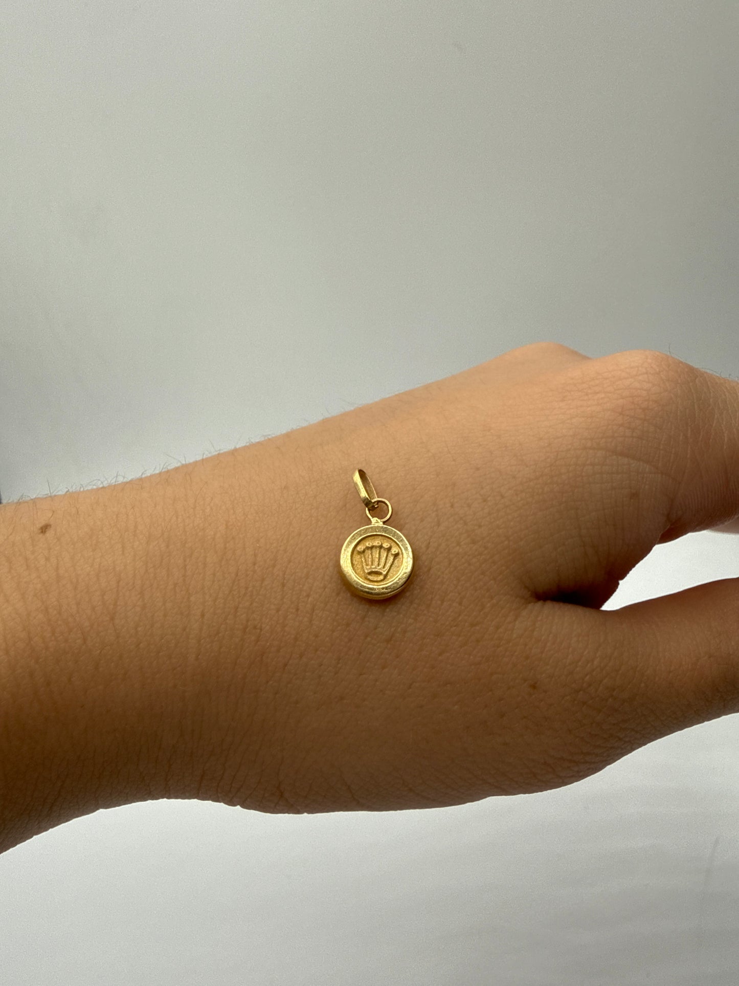Dije RX Oro amarillo 18k 0,50 Gr / 8 mm / 0,8 Cm