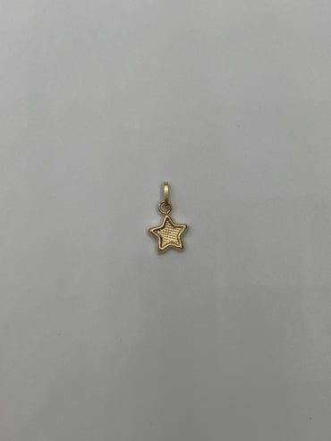 Dije estrella Oro amarillo 18k 0,28 Gr / 7 mm / 0,9 Cm