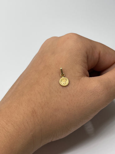 Dije RX Oro amarillo 18k 0,29 Gr / 7 mm / 0,7 Cm