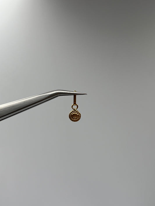 Dije RX Oro amarillo 18k 0,23 Gr / 5,5 mm / 0,5 Cm