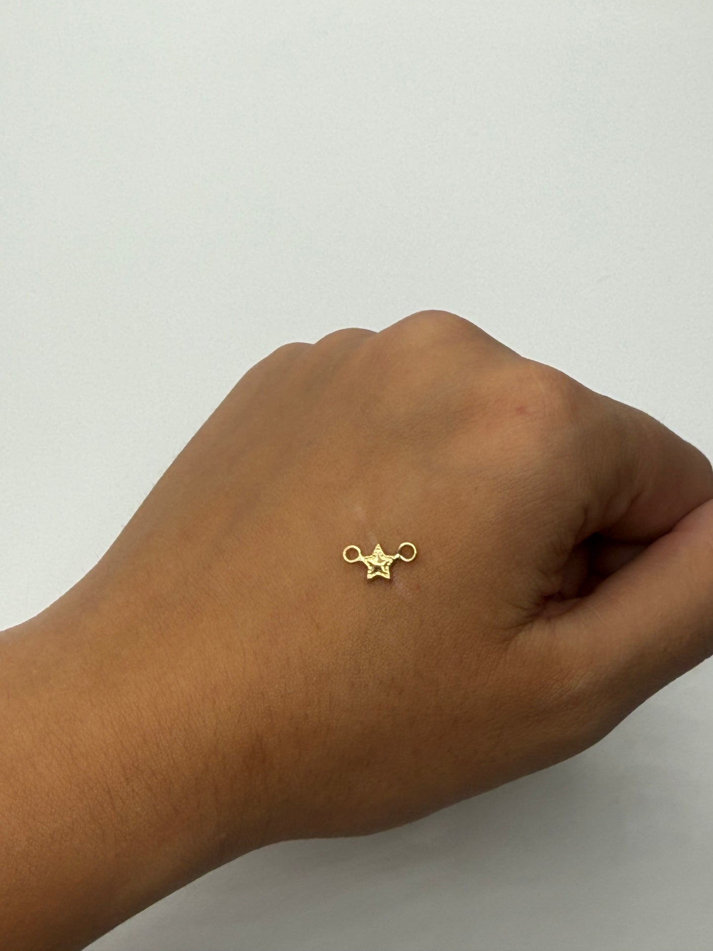 Herraje Estrella Oro amarillo 18k 0,17 Gr / 0,6 Cm