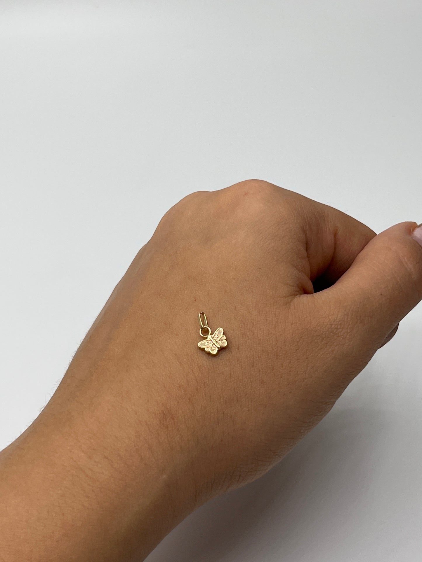 Dije Mariposa Oro amarillo 18k 0,25 Gr / 7,6 mm / 0,4 Cm