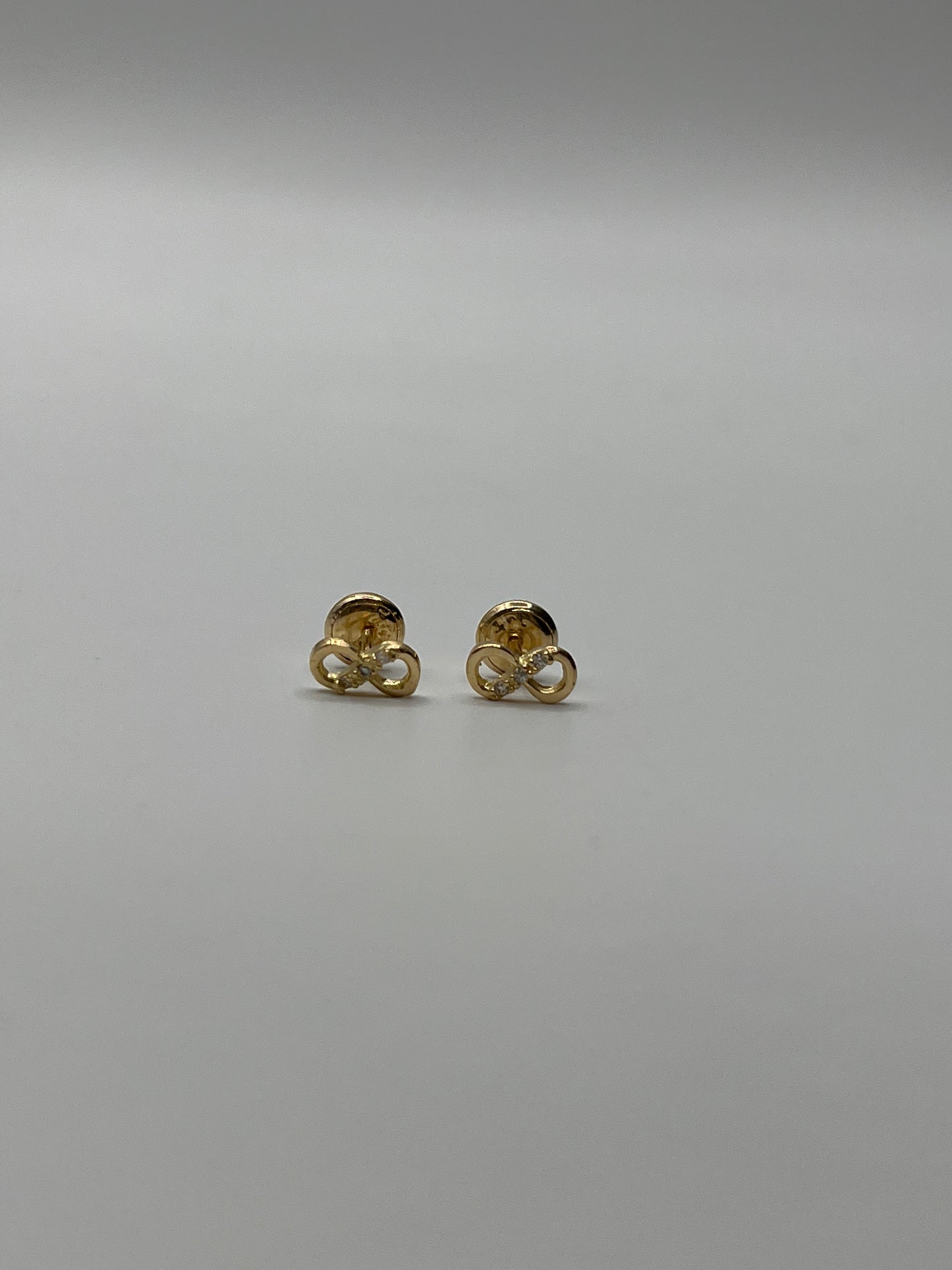Topos Infinito Circon Blanco Oro amarillo 18k 0,85 Gr / 4 mm