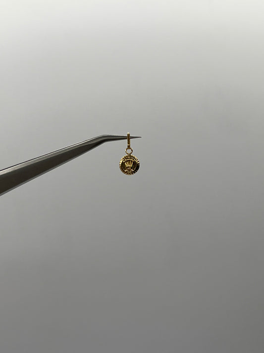 Dije RX Oro amarillo 18k 0,25 Gr / 7 mm / 0,9 Cm