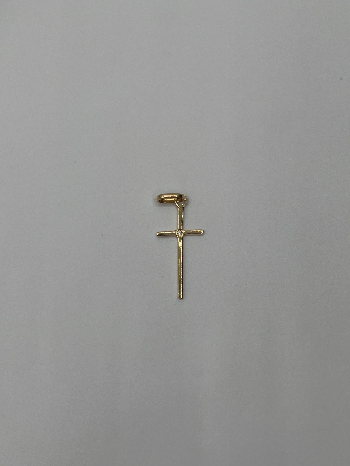 Dije cruz lisa circon blanco Oro amarillo 18k 0,58 Gr / 10 mm / 2,30 Cm