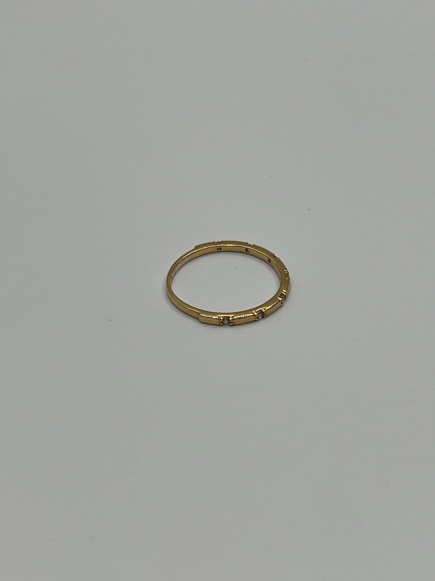 Anillo circon blanco Oro amarillo 18k / Talla 6 1/2 / 1,30 Gr / 1,32 mm