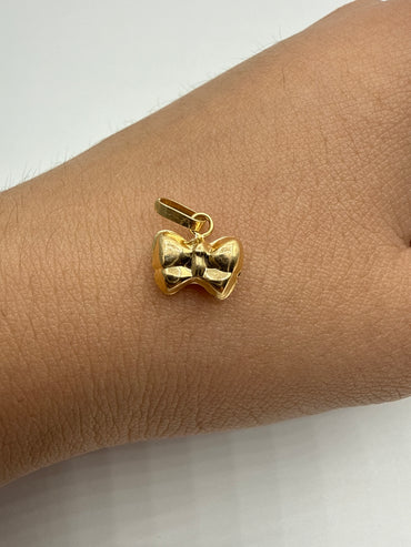Dije Moño Oro amarillo 18k 0,39 Gr / 9 mm / 0,75 Cm