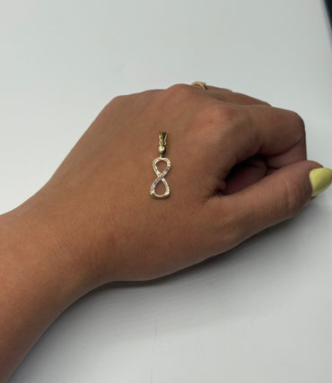 Dije Infinito Circon Lila y Azul Oro amarillo 18k 0,94 Gr / 8 mm / 2,4 Cm