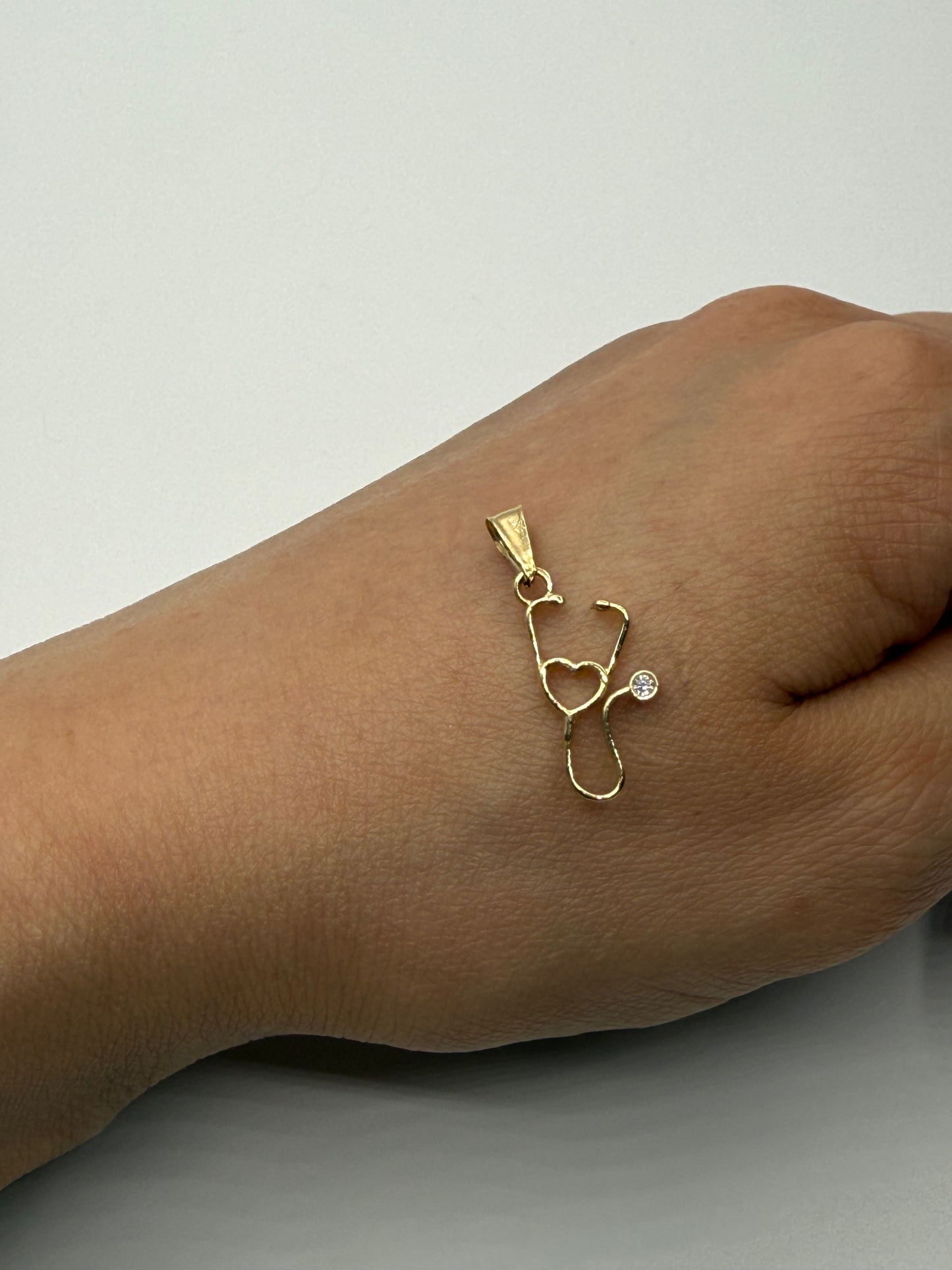 Dije Estetoscopio Oro amarillo 18k 0,80 Gr / 8,5 mm / 1,9 Cm