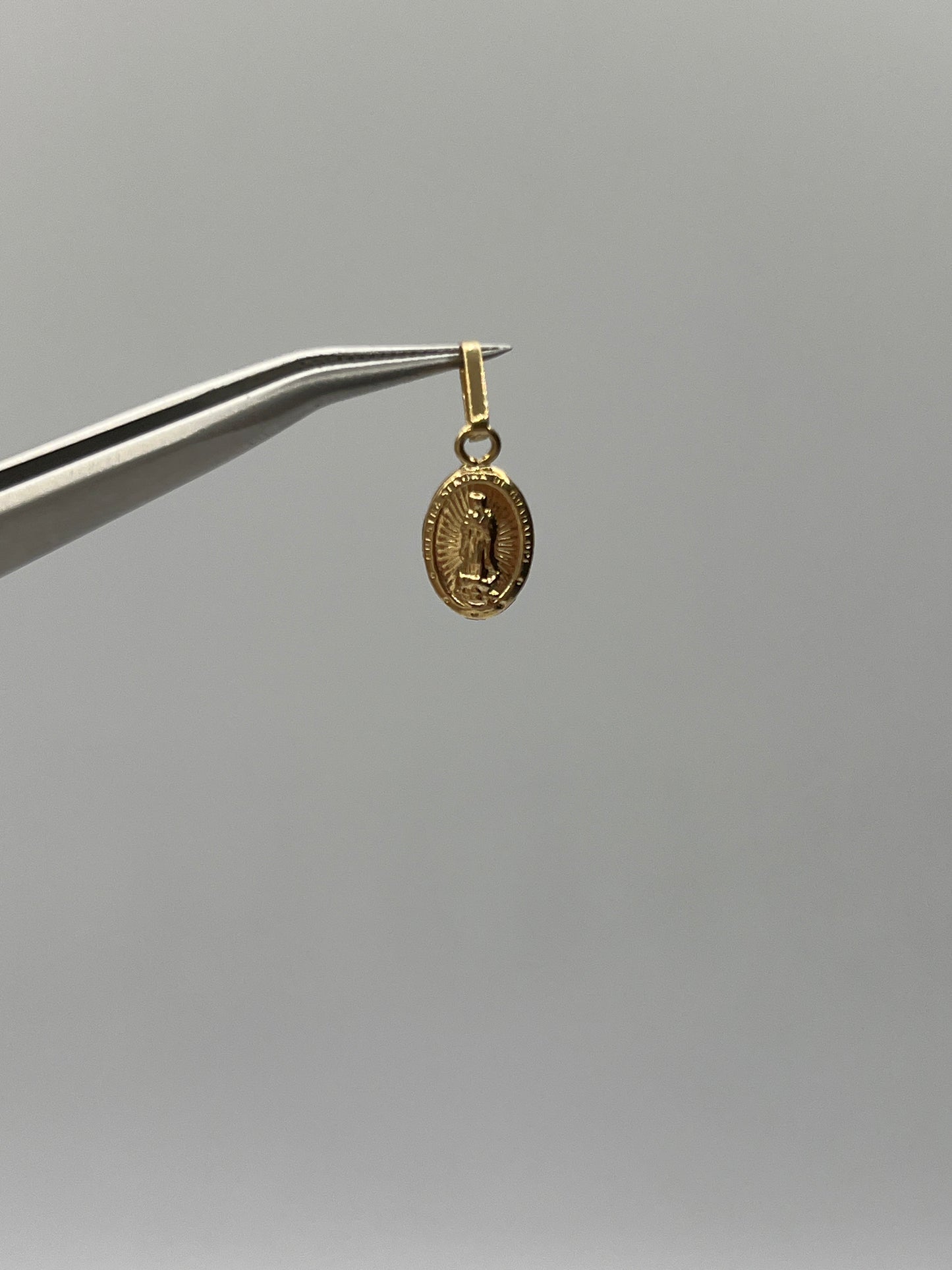 Dije Virgen Guadalupe Oro amarillo 18k 0,38 Gr / 7,4 mm / 1 Cm