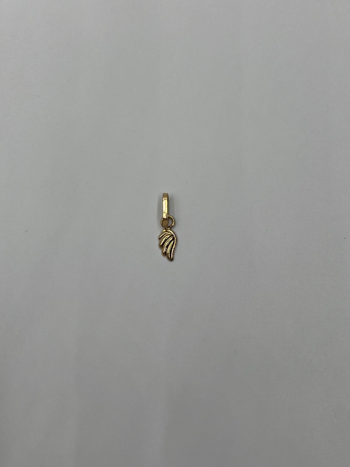 Dije Ala Oro amarillo 18k 0,19 Gr / 4 mm / 0,9 Cm