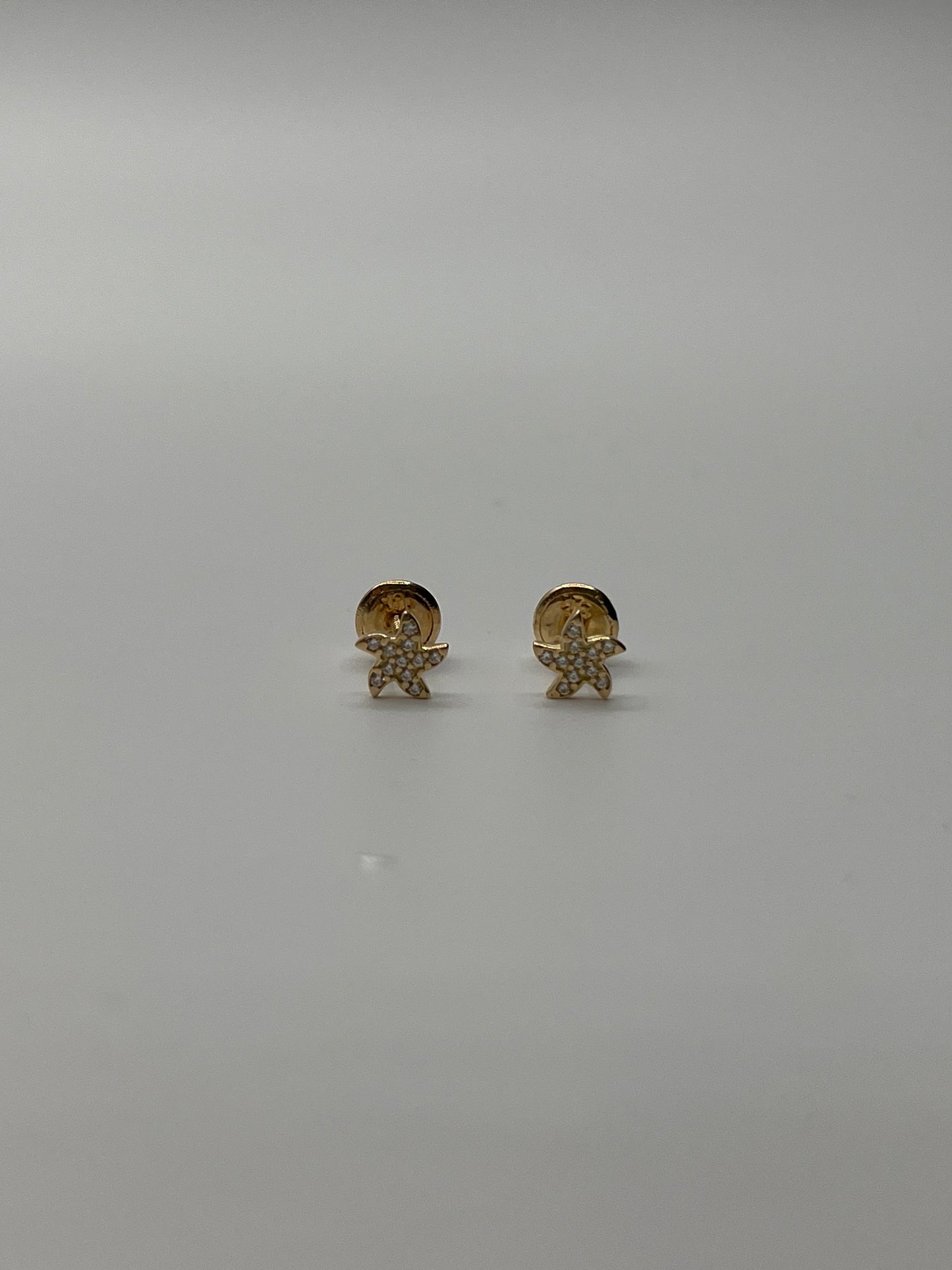 Topos Estrella de Mar Diamantada Oro amarillo 18k 0,67 Gr / 6 mm