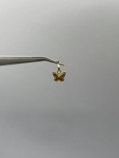Dije Mariposa Diamantada Oro amarillo 18k 0,34 Gr / 8,20 mm / 0,8 Cm