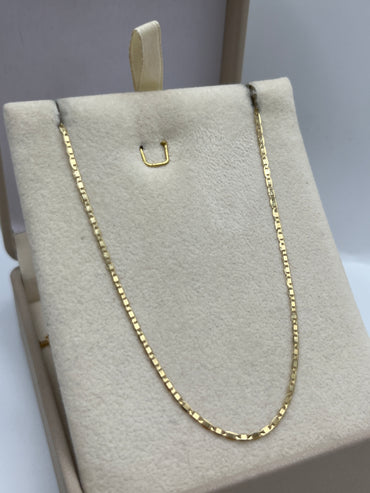 Cadena It Plana Tres oros 18k +3 / 1,38 Gr / 1,30 mm / 45 Cm