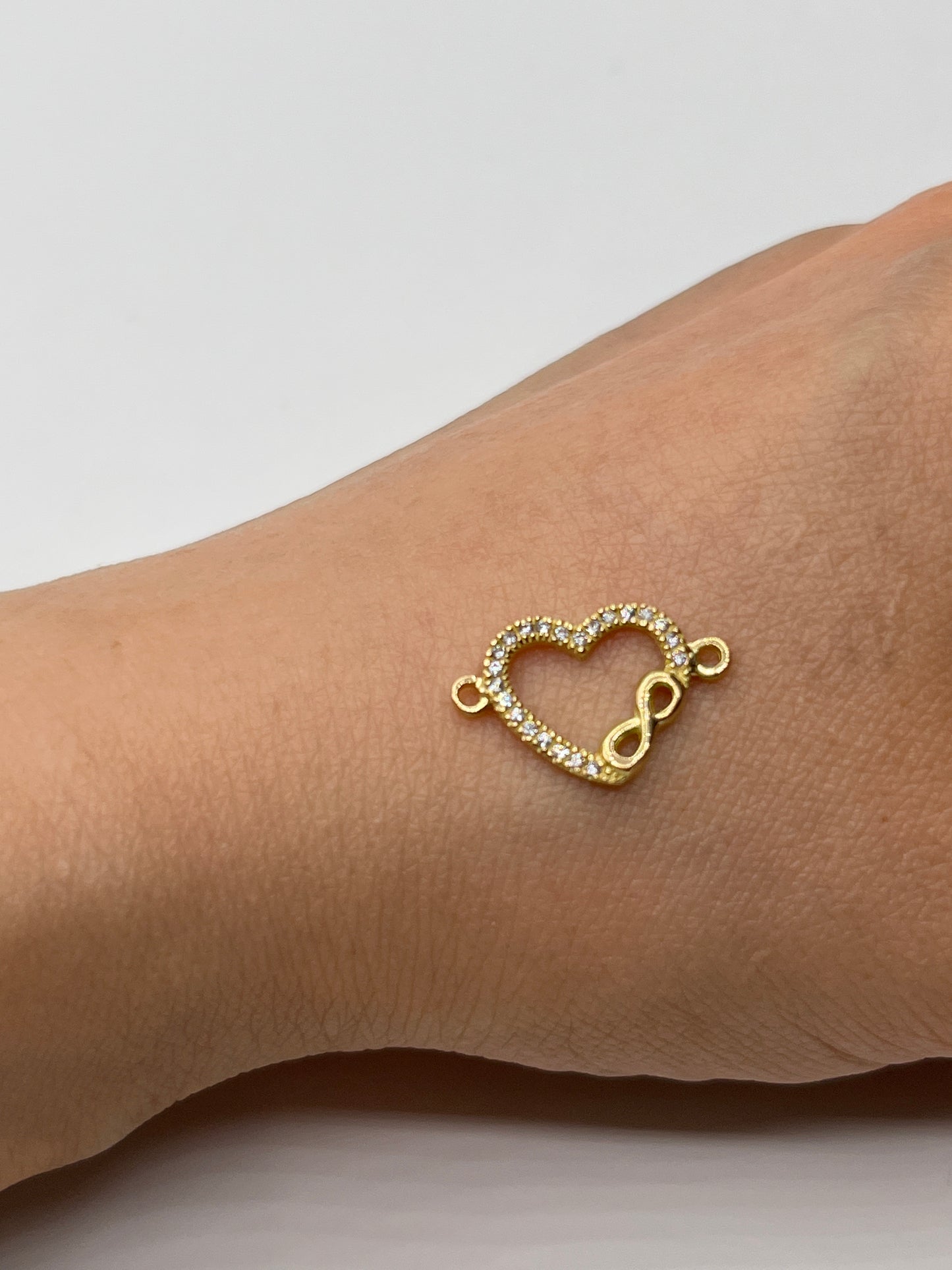 Herraje Corazon Infinito Circon Blanco Oro amarillo 18k 0,86 Gr / 1,2 Cm