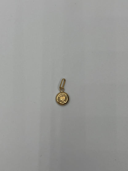 Dije RX Oro amarillo 18k 0,25 Gr / 7 mm / 0,9 Cm