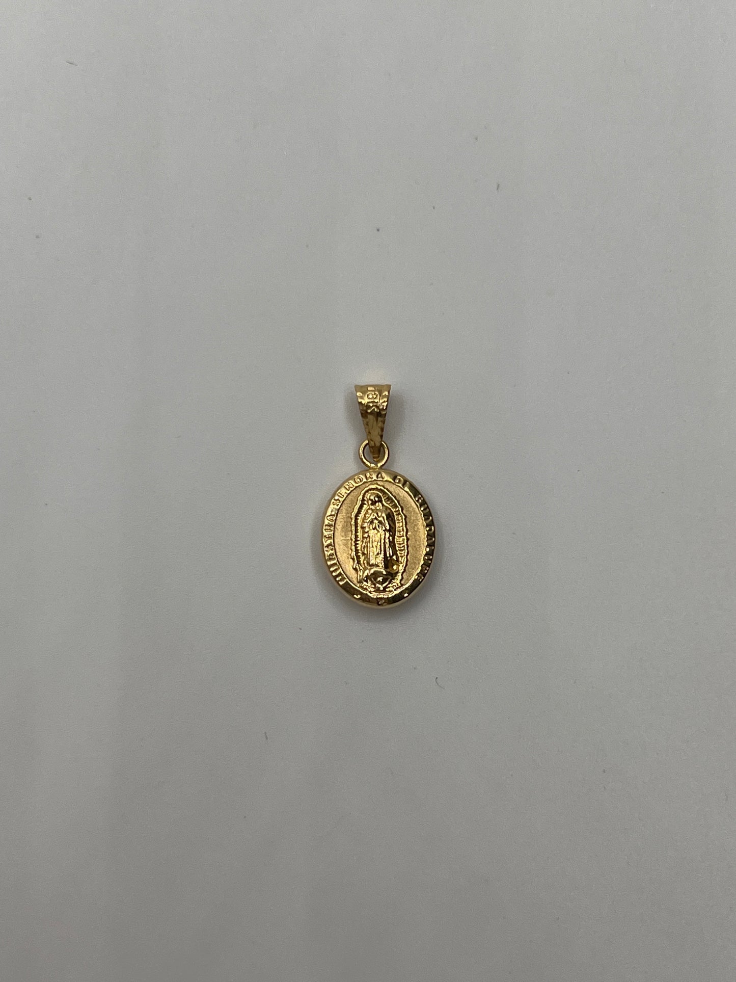 Dije Virgen Guadalupe Oro amarillo 18k 0,67 Gr / 10 mm / 1,4 Cm
