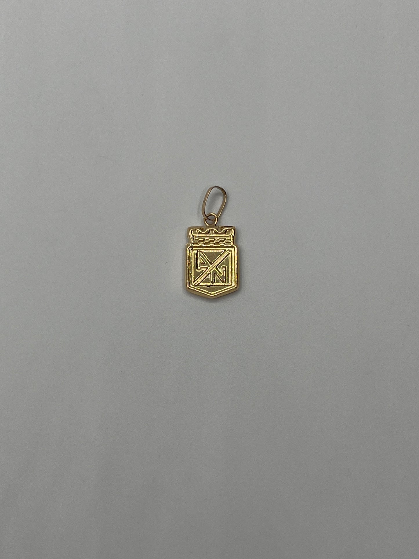 Dije Atletico Nacional Oro amarillo 18k 0,55 Gr / 9,15 mm / 1,5 Cm