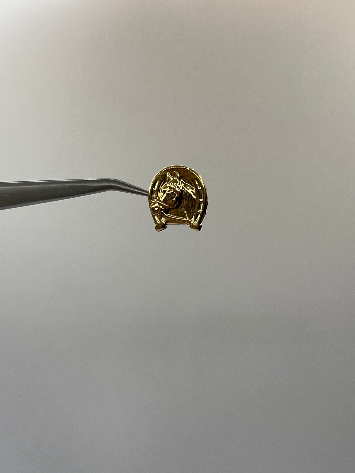 Dije Caballo Oro amarillo 18k 0,81 Gr / 13,50 mm / 1,5 Cm