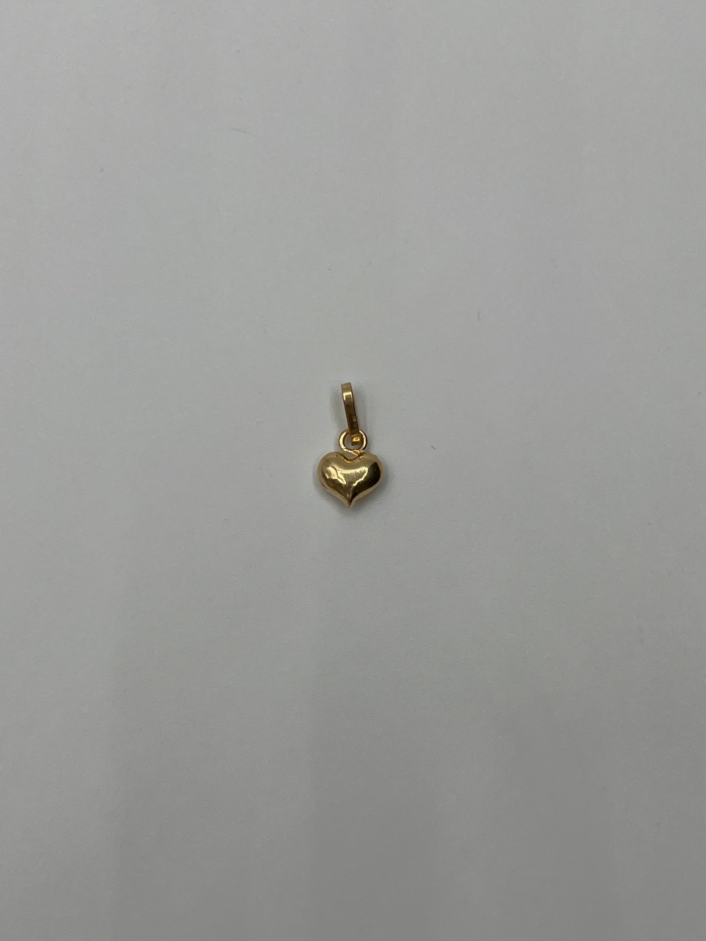 Dije Corazon Liso Oro amarillo 18k 0,25 Gr / 6,60 mm / 0,8 Cm