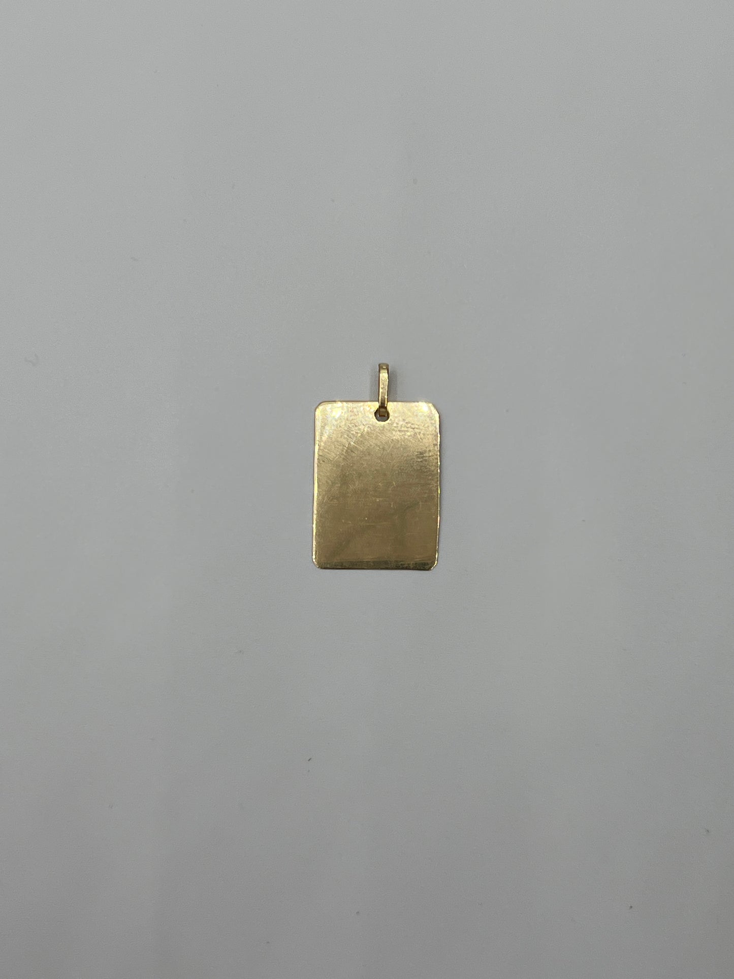Dije placa Oro amarillo 18k 1 Gr / 14 mm / 1,9 Cm