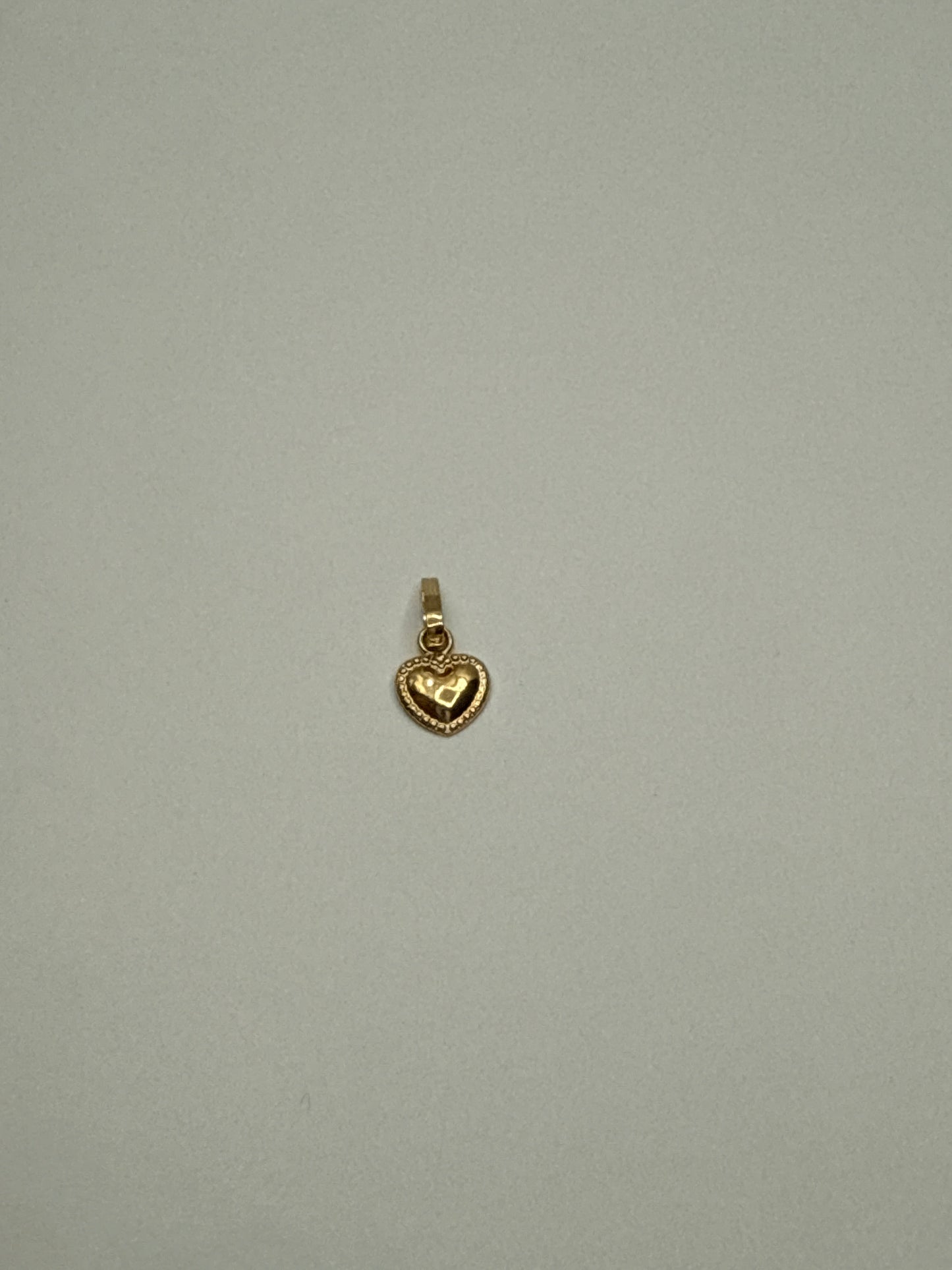 Dije corazon Oro amarillo 18k 0,36 Gr / 8,10 mm / 1 Cm