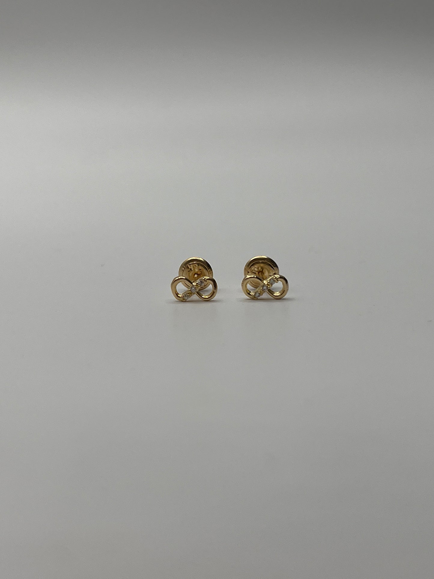 Topos Infinito Circon Blanco Oro amarillo 18k 0,78 Gr / 7,30 mm