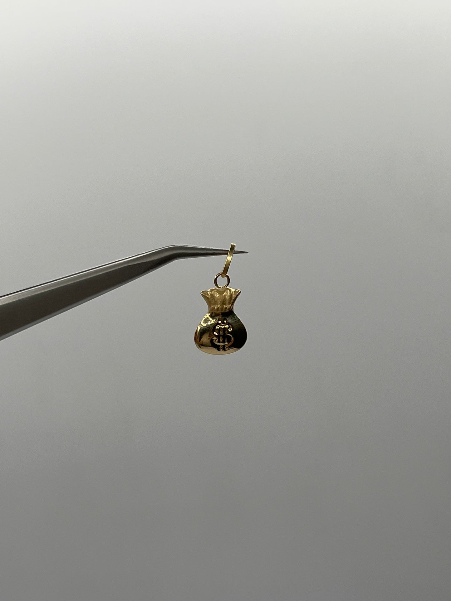 Dije Bolsa dinero Oro amarillo 18k 0,62 Gr / 9 mm / 1,4 Cm