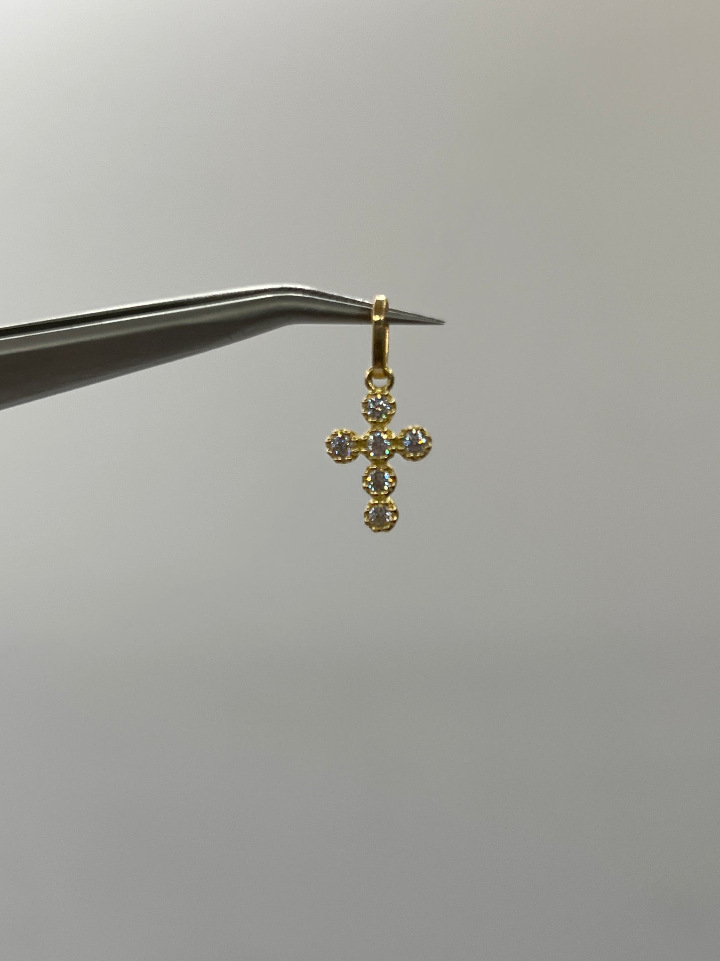 Dije cruz circon blanco Oro amarillo 18k 0,70 Gr / 8,75 mm / 1,4 Cm