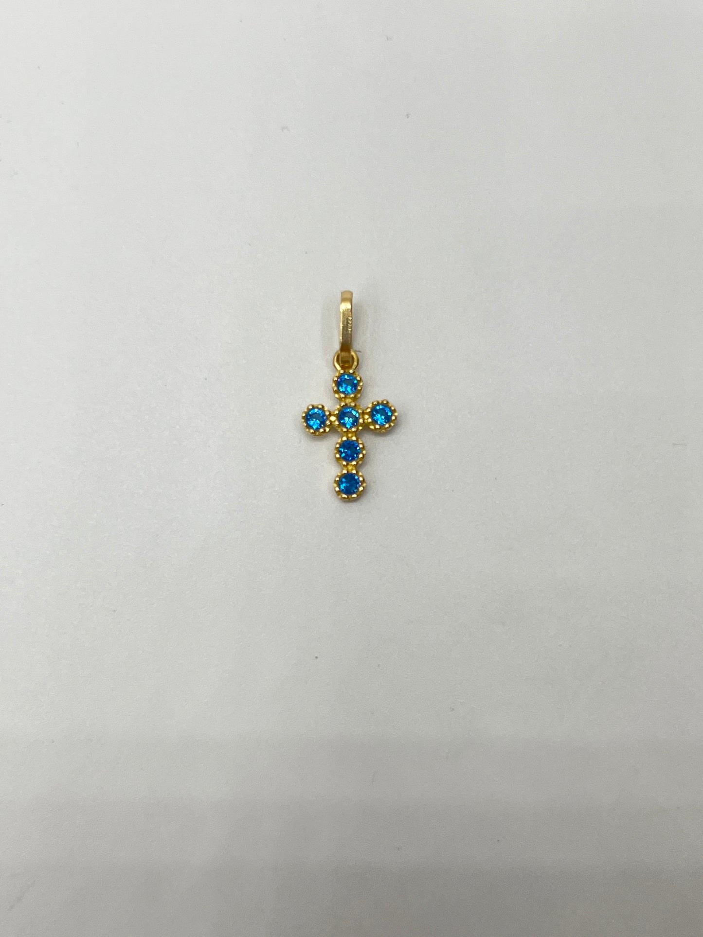 Dije cruz circon azul Oro amarillo 18k 0,59 Gr / 8,67 mm / 1,5 Cm