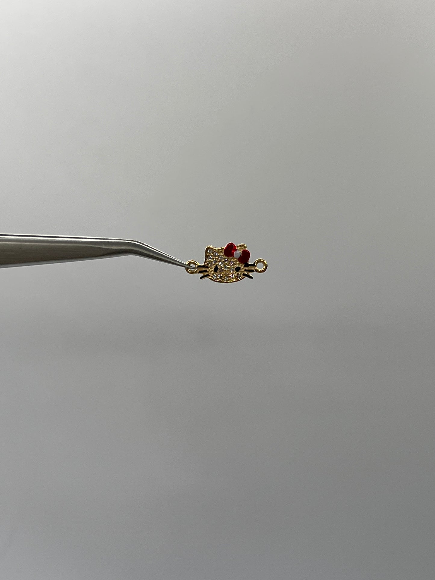 Herraje Hello Kitty Oro amarillo 18k 0,83 Gr / 0,8 Cm