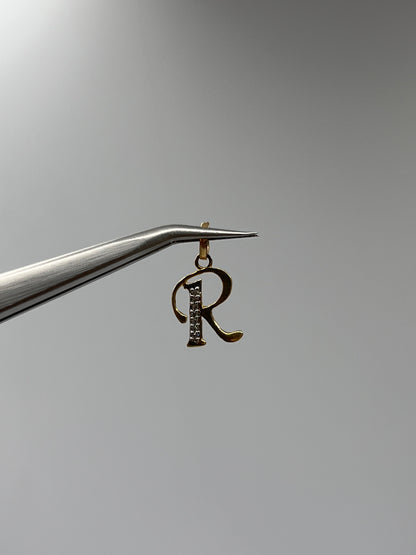 Dije Letra R Circon Blanco Oro amarillo 18k 0,66 Gr / 9,4 mm / 1,1 Cm