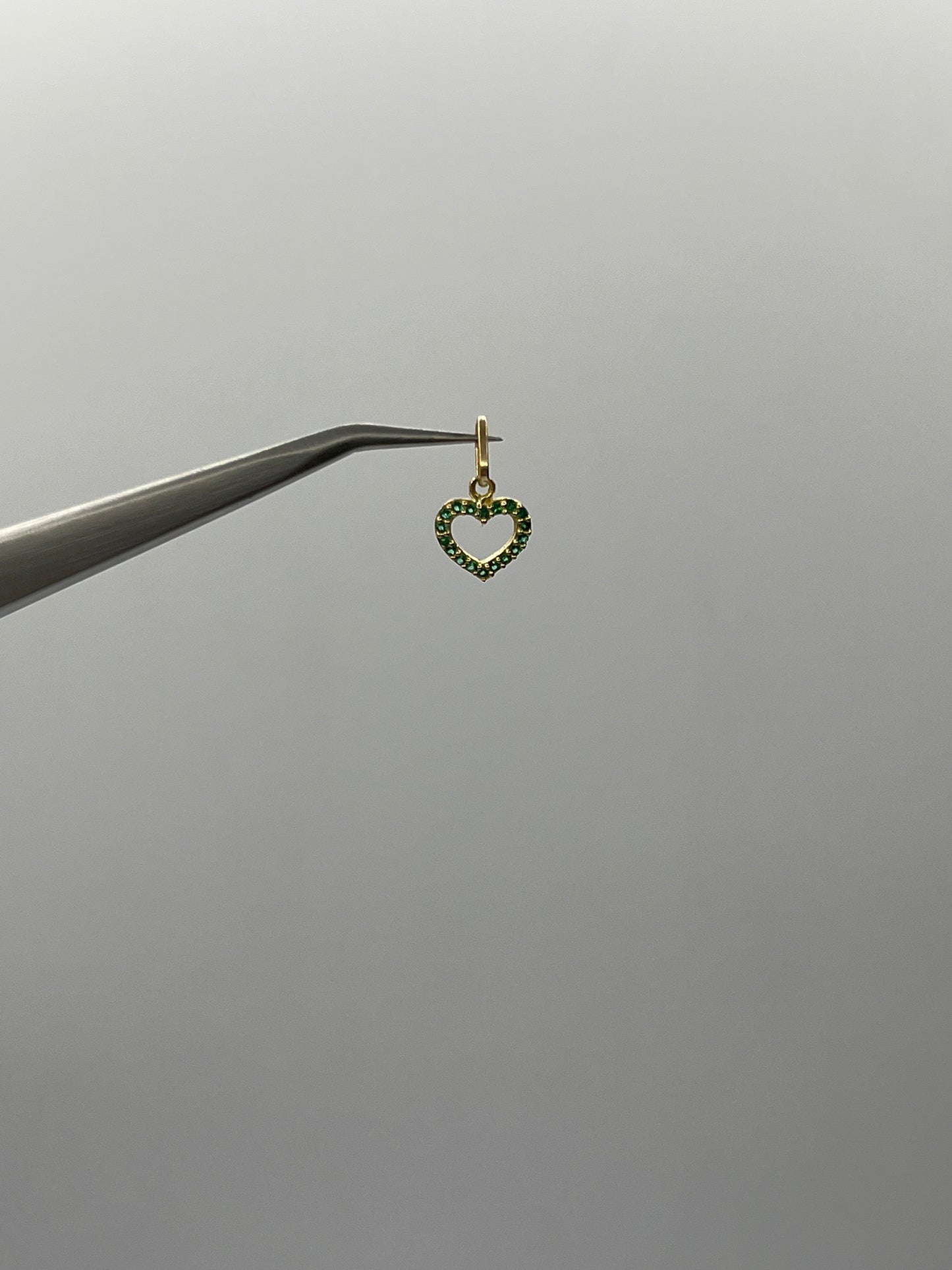 Dije corazon circon verde Oro amarillo 18k 0,40 Gr / 8,90 mm / 0,97 Cm