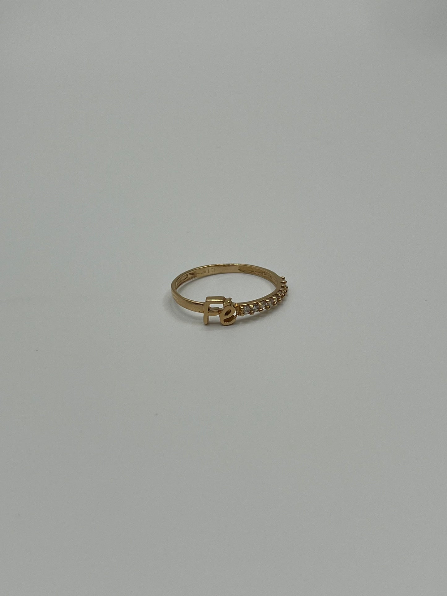 Anillo fé circon blanco Oro amarillo 18k / Talla 6 3/4 / 1,37 Gr / 4,56 mm