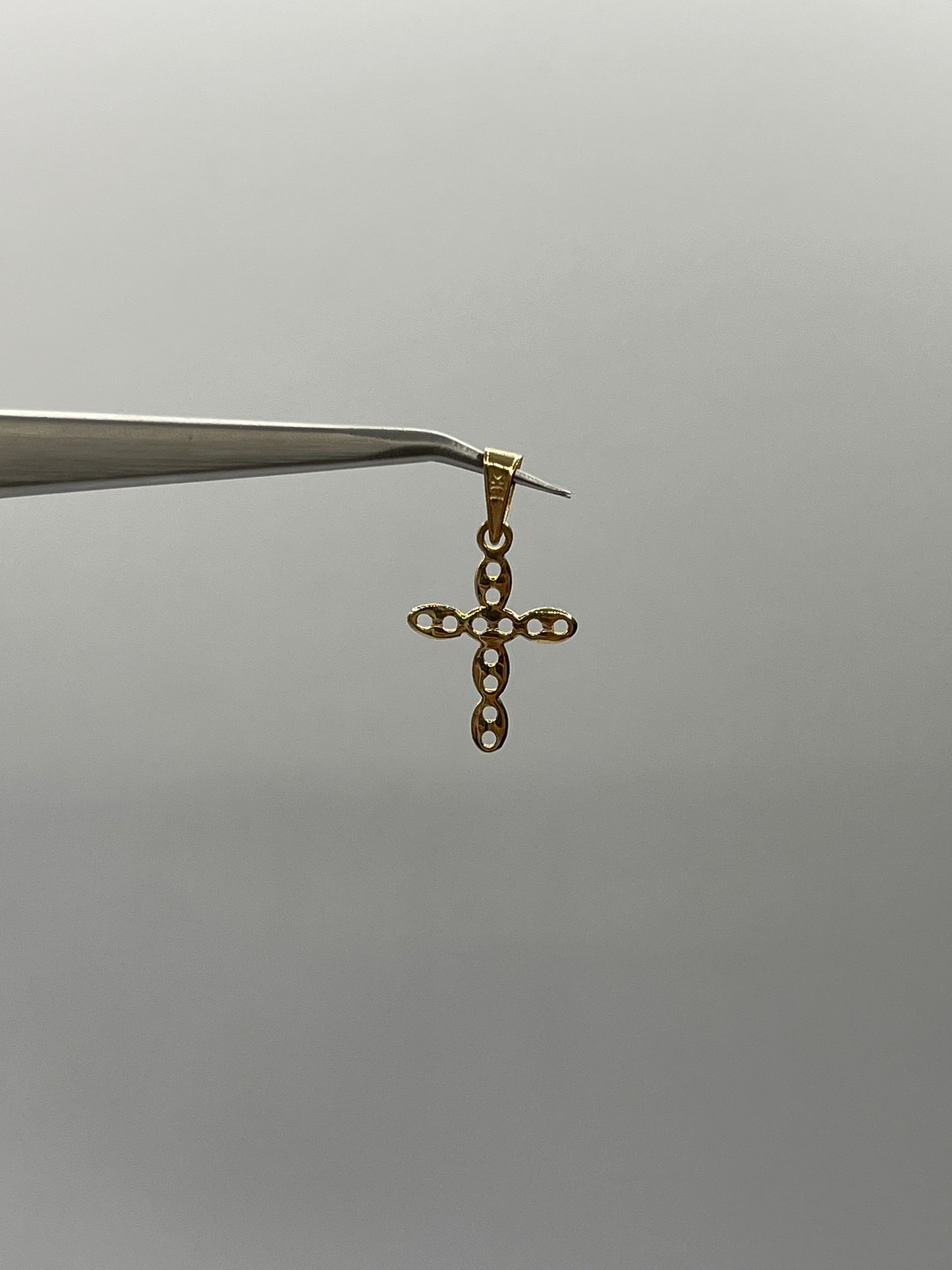 Dije Cruz GC Oro amarillo 18k 0,85 Gr / 15,50 mm / 2,15 Cm