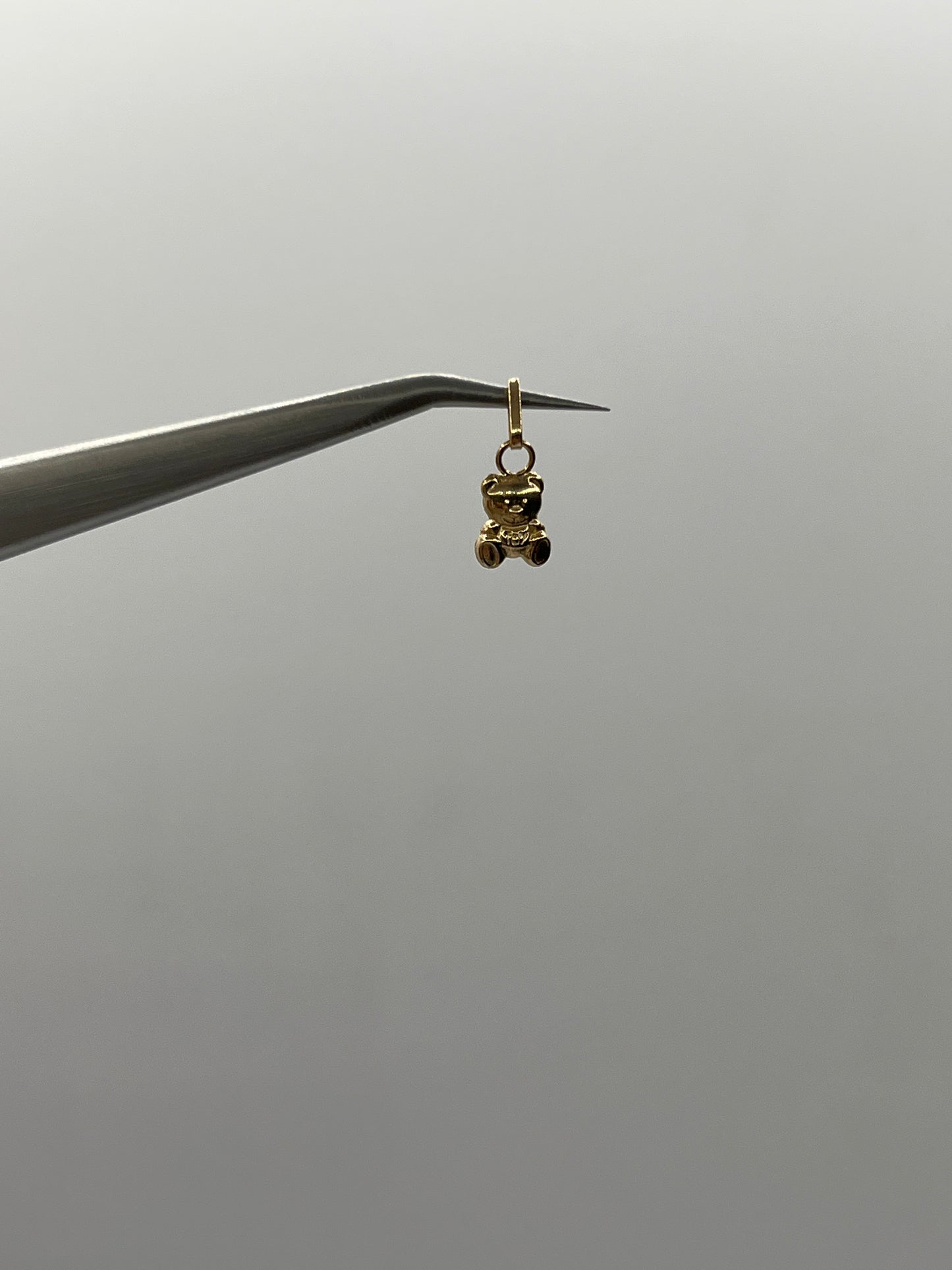 Dije oso Oro amarillo 18k 0,28 Gr / 5 mm / 0,9 Cm