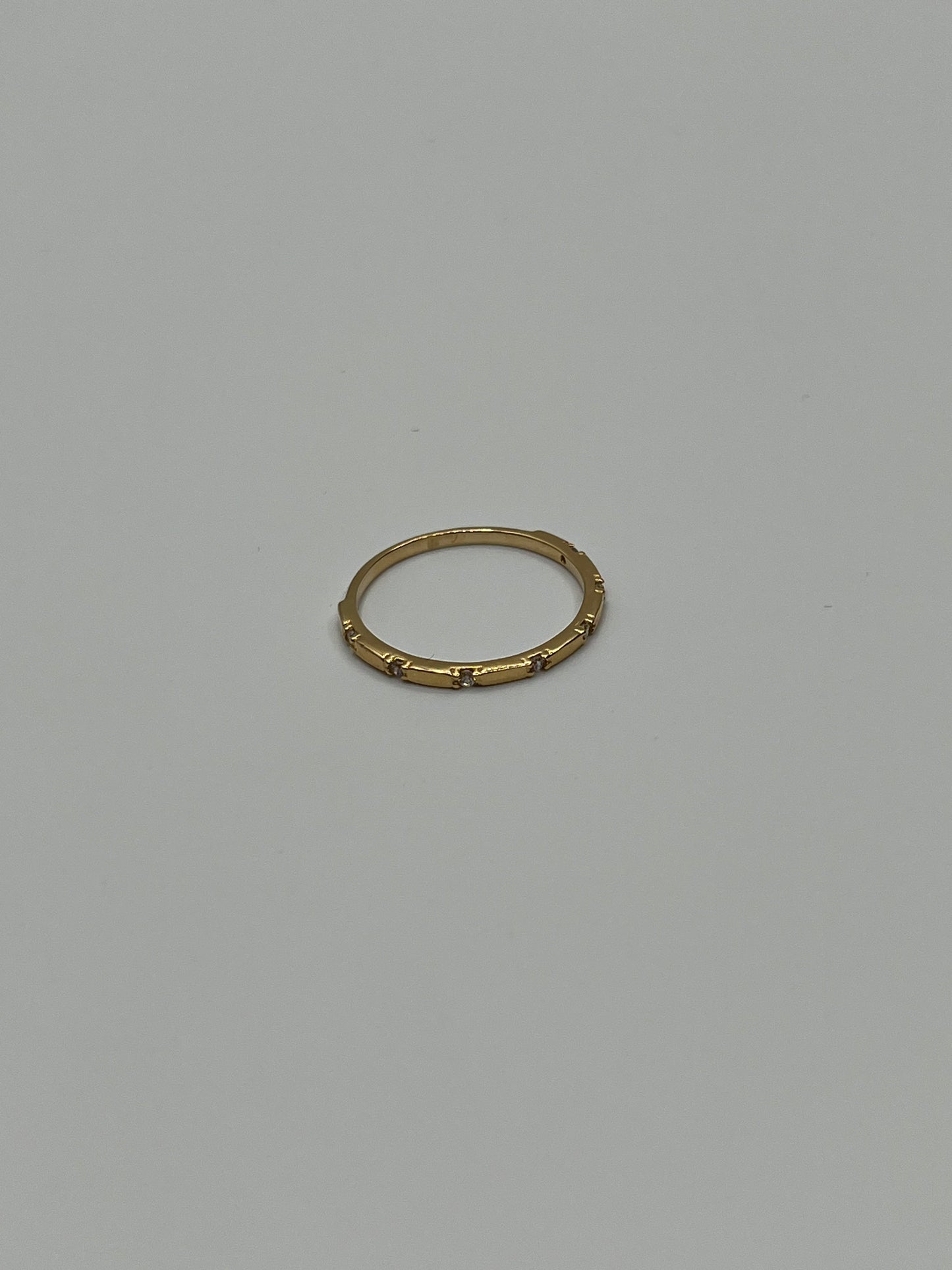Anillo circon blanco Oro amarillo 18k / Talla 6 1/2 / 1,30 Gr / 1,32 mm