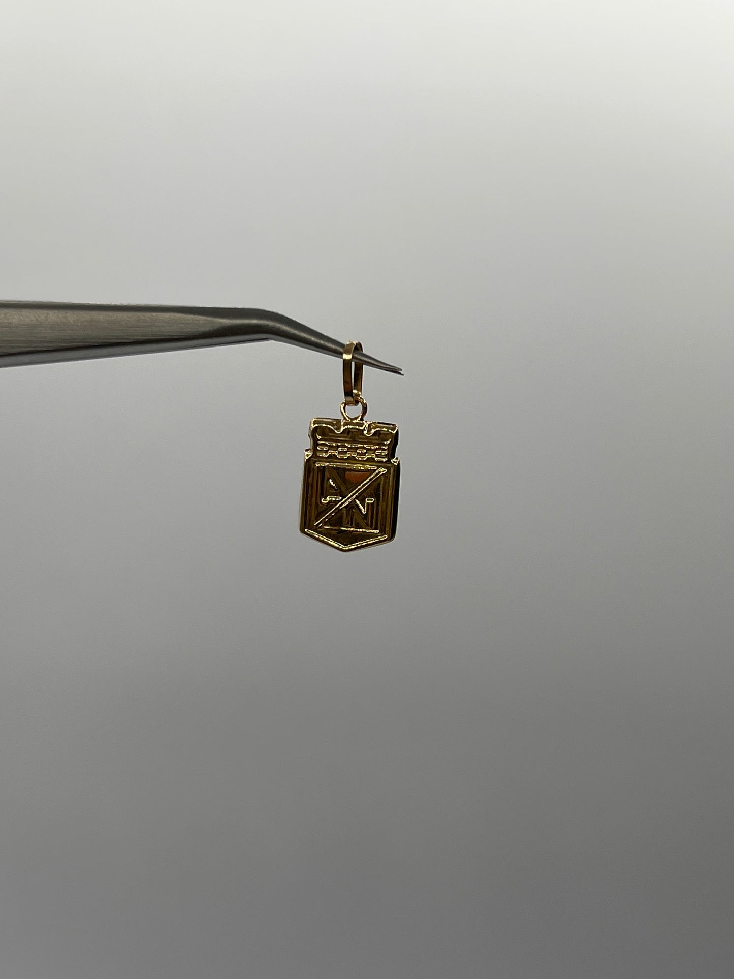 Dije Atletico Nacional Oro amarillo 18k 0,55 Gr / 9,15 mm / 1,5 Cm