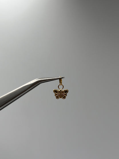 Dije Mariposa Oro amarillo 18k 0,25 Gr / 7,6 mm / 0,4 Cm