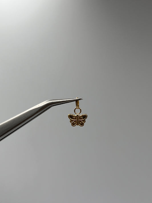 Dije Mariposa Oro amarillo 18k 0,25 Gr / 7,6 mm / 0,4 Cm