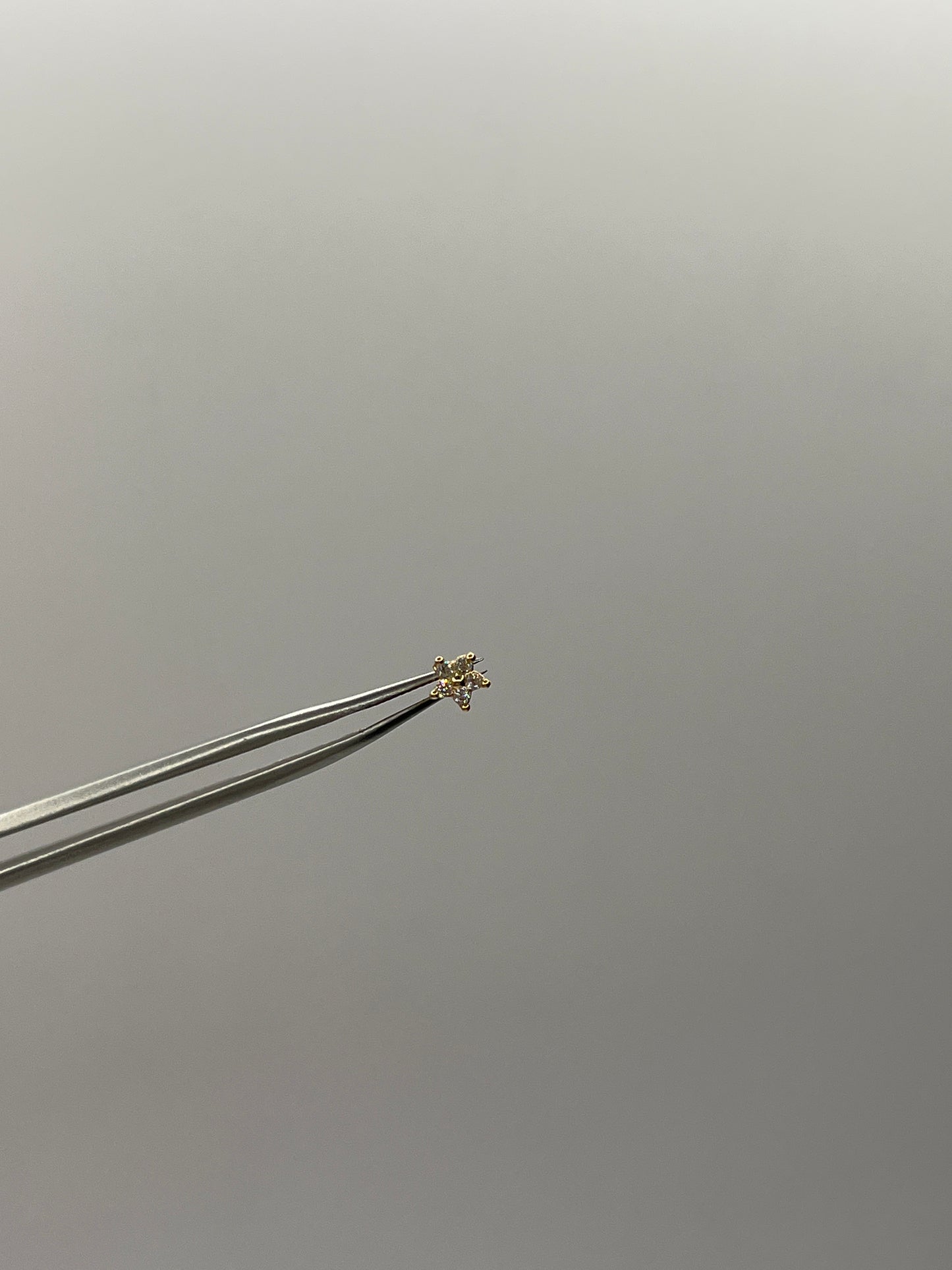 Piercing Oreja Flor Circon Blanco 0.38Gr