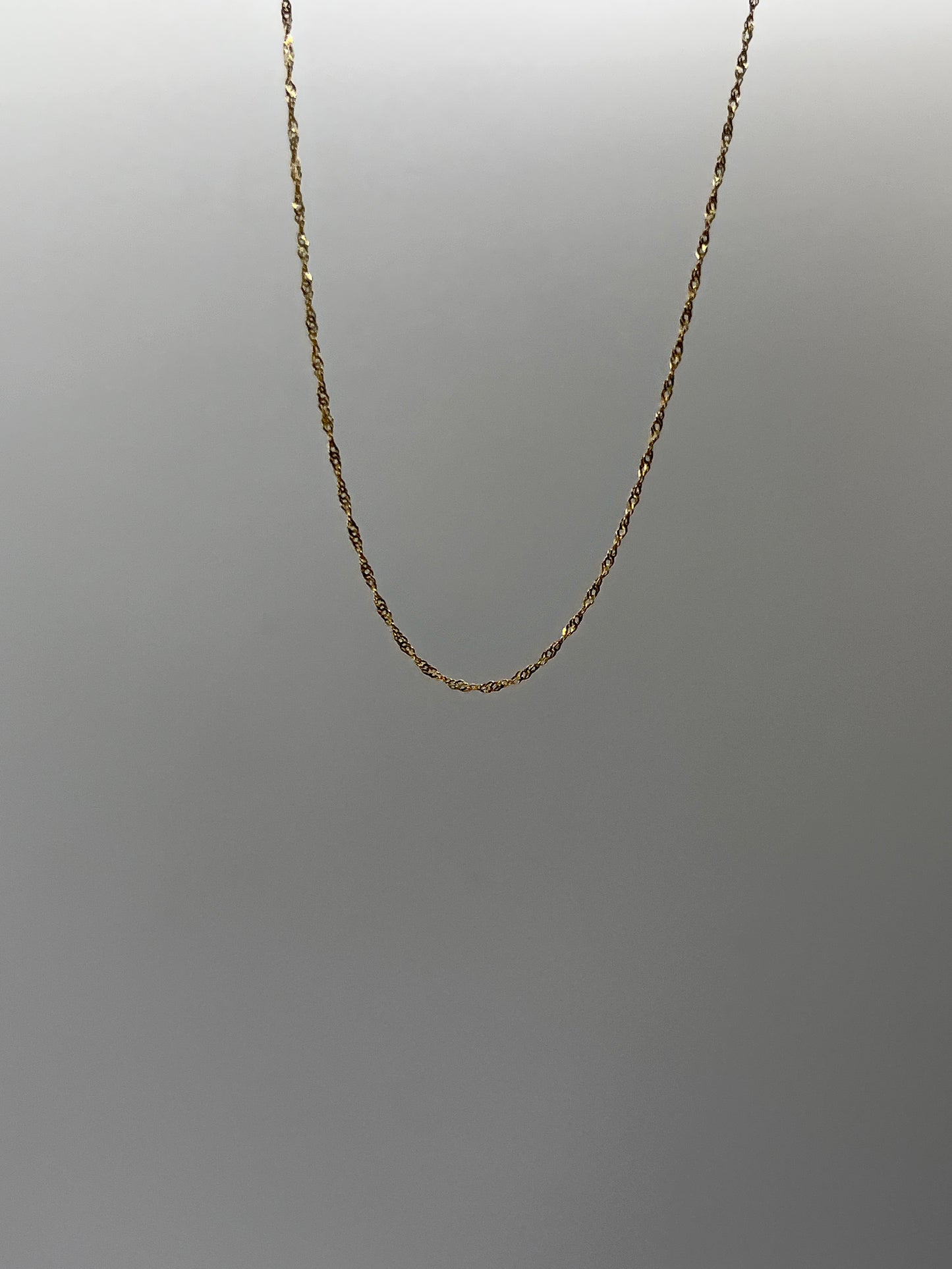 Cadena It Singapur Oro amarillo 18k +3 / 1,04 Gr / 0,60 mm / 45 Cm