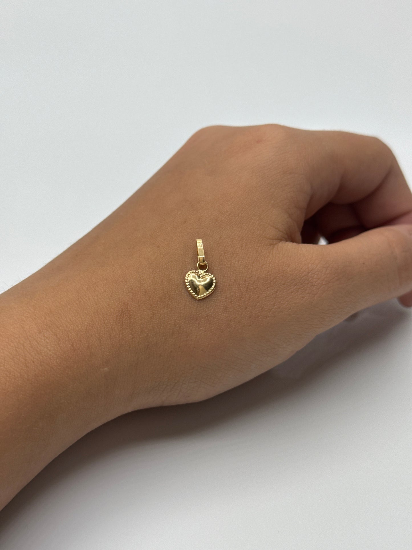 Dije corazon Oro amarillo 18k 0,36 Gr / 8,10 mm / 1 Cm