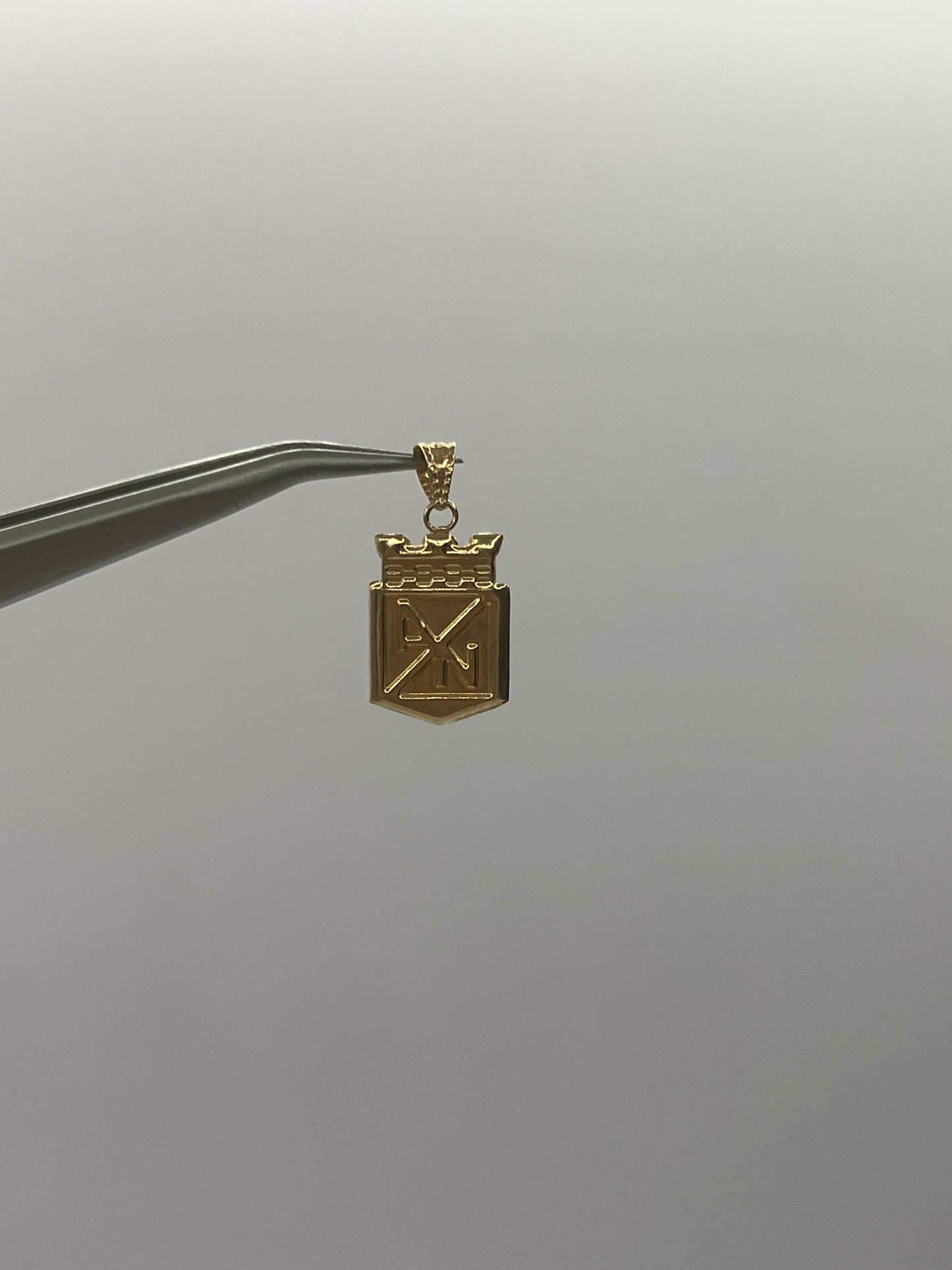 Dije Atletico Nacional Oro amarillo 18k 0,65 Gr / 10,9 mm / 1,5 Cm