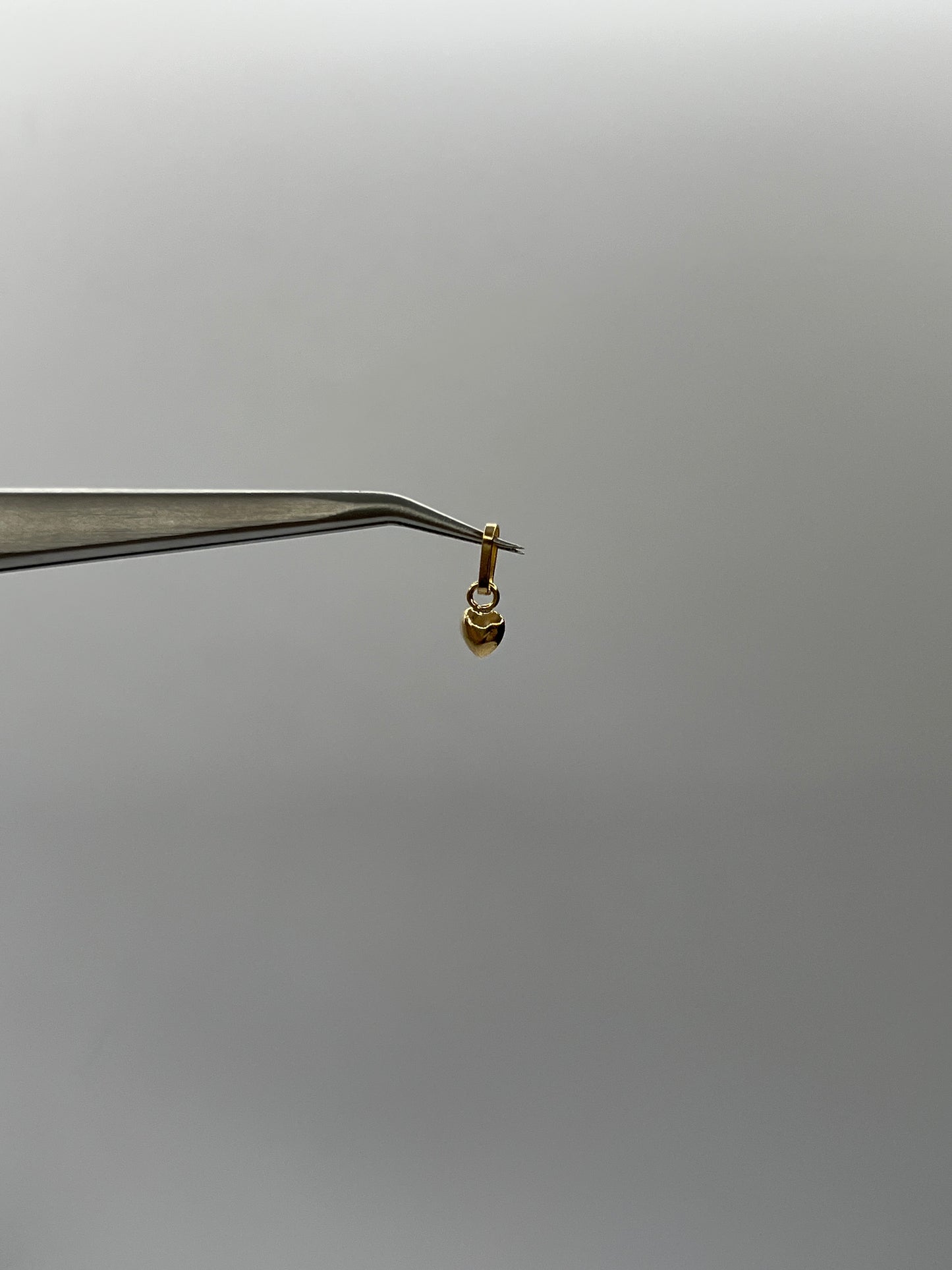 Dije Corazon Liso Oro amarillo 18k 0,20 Gr / 4,7 mm / 0,7 Cm