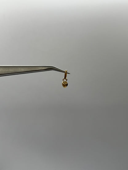 Dije Corazon Liso Oro amarillo 18k 0,20 Gr / 4,7 mm / 0,7 Cm