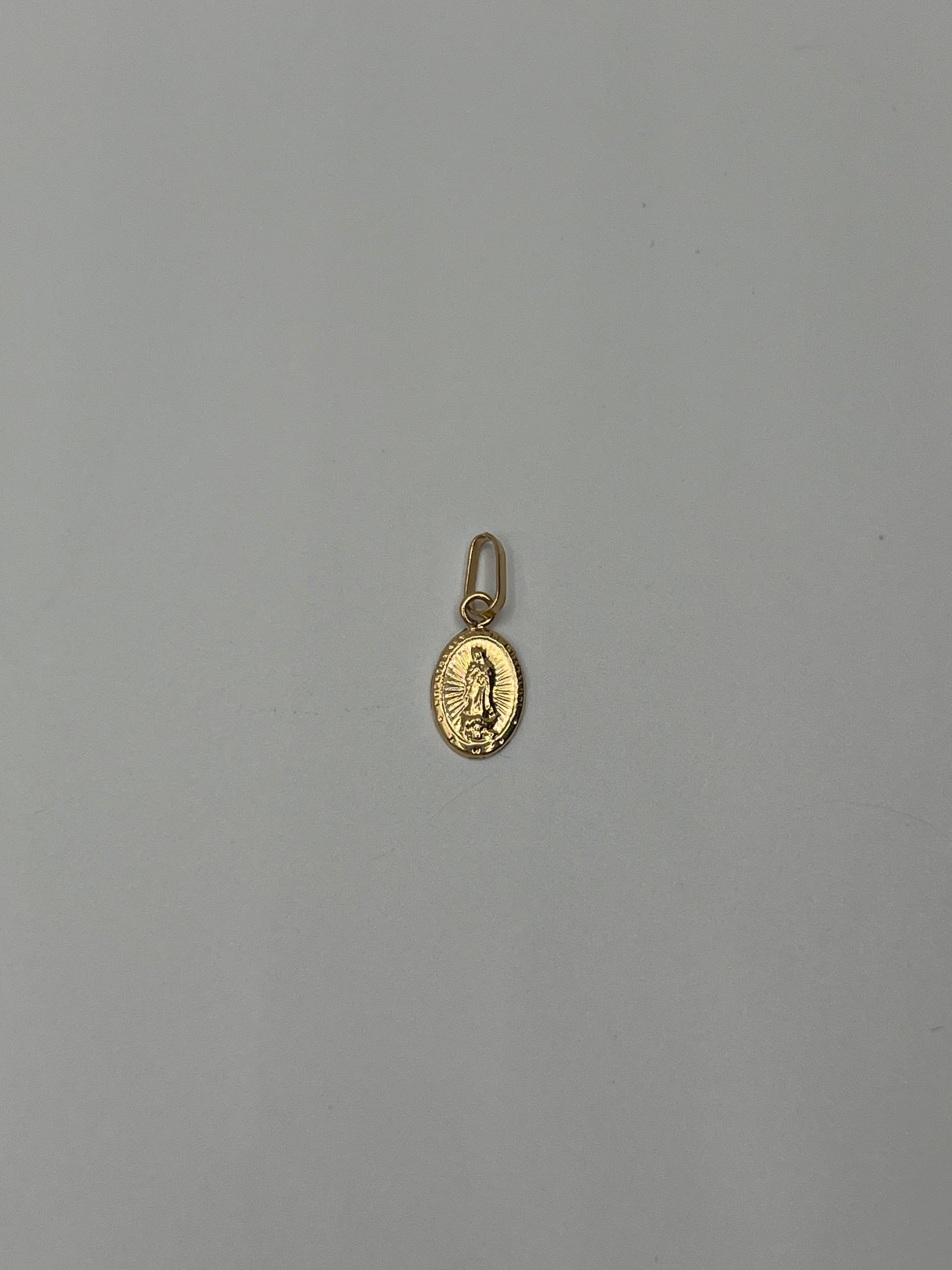 Dije Virgen Guadalupe Oro amarillo 18k 0,38 Gr / 7,4 mm / 1 Cm